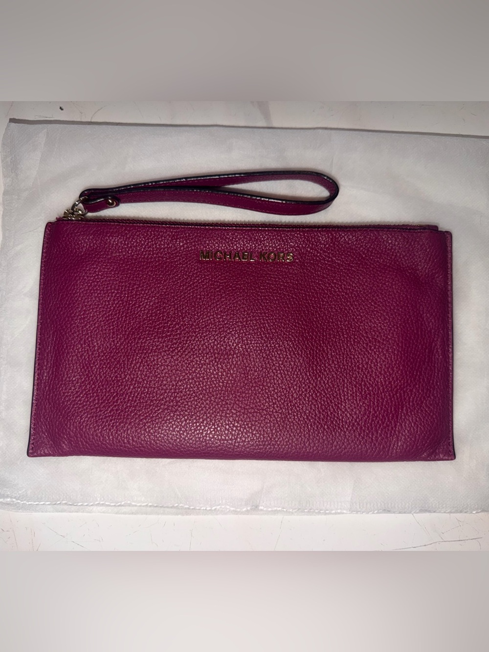 Michael Kors Magenta Pebbled Leather Wristlet with Gold Logo